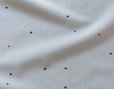 Bio Renforce Stoff aus reiner Bio-Baumwolle mit Punktemuster in Beige von Cotonea fabrics 